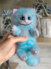 Чеширчик спицами.